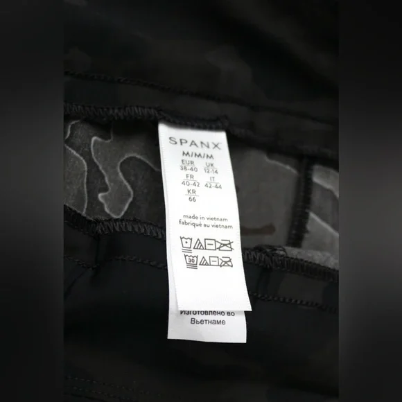 NWT- Spanx shorts in a black camo print. Size medium - Picture 2 of 5